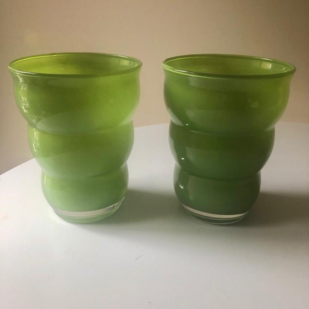 Two green glass vases